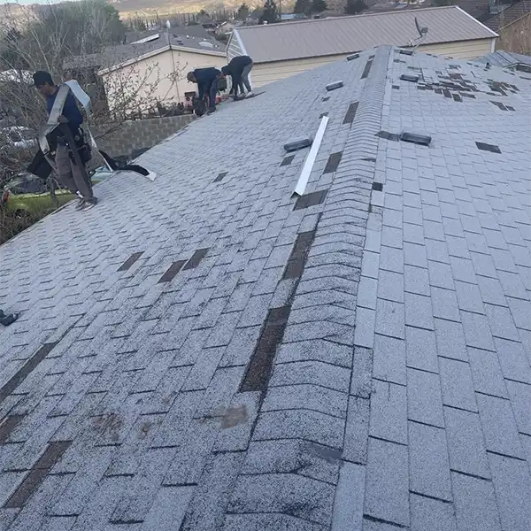 damaged shingle roof on Southern Utah home