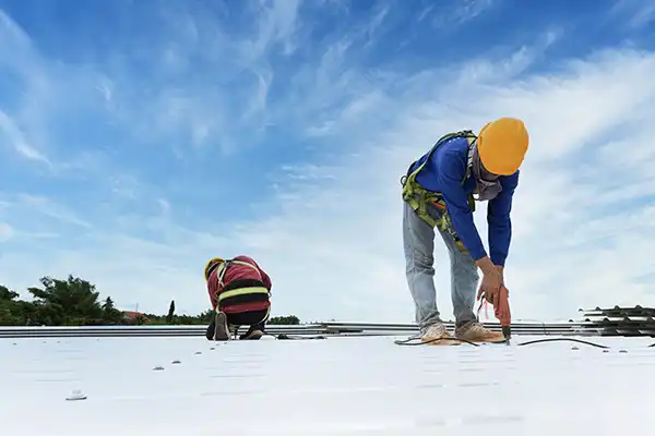 commercial roofers installing a new commercial roof in Southern Utah